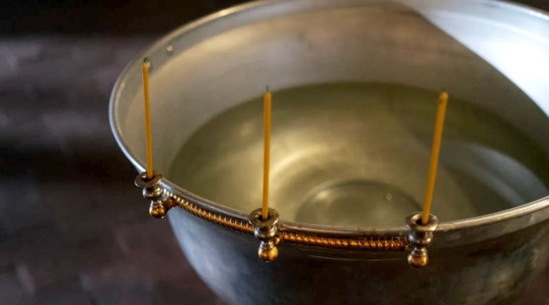 Container of Holy Water in a church